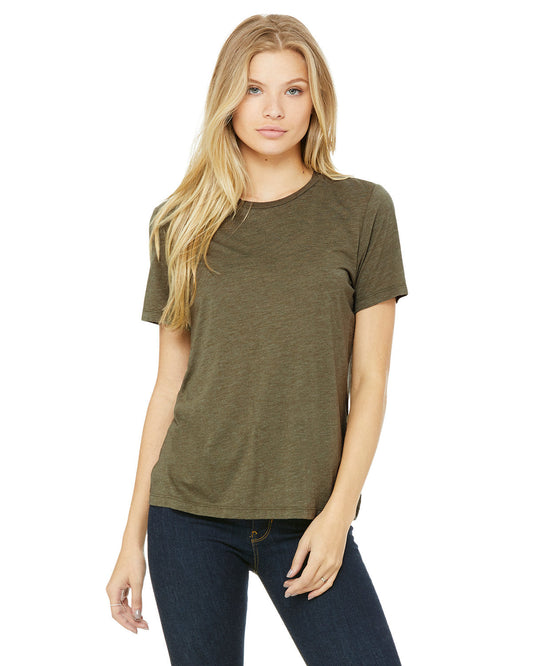 woman wearing olive green asdasd t-shirt and dark jeans